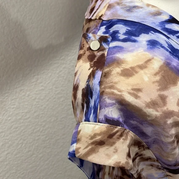 Jennifer Lopez cross wrap blouse. Sheer print. Tab shoulder. Asymmetrical hem. - Picture 2 of 9